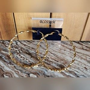 *3/$15* Stainless steel twisted gold hoop earrings